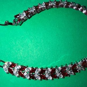 Ruby gem and silver woman’s bracelets